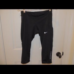 Nike knee high dri fit running leggings size small